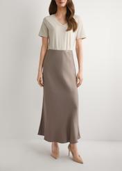 Brown women's skirt SPCDT-0122-1K(W26), front view of the product on the model. Half of the silhouette visible.