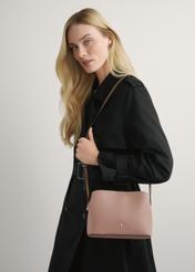 Pink small women's handbag TOREC-0768-5A(W26), product view on model's shoulder. Half of silhouette visible.