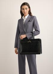 Leather black croco laptop bag TORES-1321-9G(Z26), product view on the model's shoulder, half of the silhouette visible.