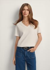 Cream basic women's T-shirt TSHDT-0120-0B(W26) - front view of the product on a model, against a white background. Knee-length silhouette visible.