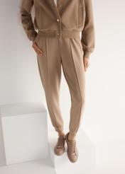 Women's pink leather sneakers BUTYD-1068-5D(W26), product view from the front on the model, half of the silhouette visible.