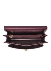 Small burgundy women's handbag with an elegant clasp TOREC-1322-4D(Z26), product view inside on a white background.