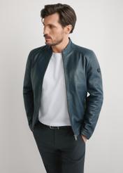 Navy blue men's leather jacket KURMS-0329-7E(W26) - front product view, modeled, against a light background. Knee-length silhouette visible.