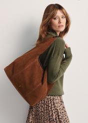 Brown suede women's handbag TORES-1167-88(Z25) - product view on a model on a white background. Half of the silhouette visible.