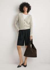 Dark brown leather shopper bag TORES-1307-1I(W26), product view in model's hand. Full body visible.