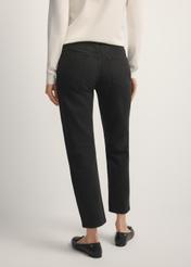 Women's black denim jeans JEADT-0011-99(W26), back view of the product on the model. Half of the silhouette visible.