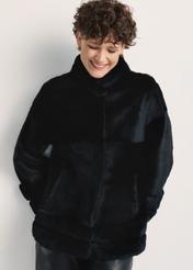 Black women's fur coat with a stand-up collar, natural FUTDF-0077-0984(Z24), front view of the product on a model, half of the silhouette visible.