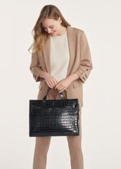 Black large croco leather handbag TORES-1132-9G(Z26) - front view of the product, held by the model in her hand, on a light background.