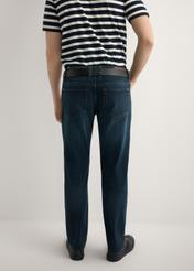 Men's dark blue denim trousers JEAMT-0022-7C(W26), product view from the back on the model. Half of the silhouette visible.