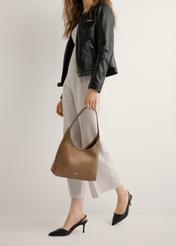 Black leather pumps with a cut-out heel BUTYD-1078A-99(W26), side view of the product on the model's feet, on a light background.