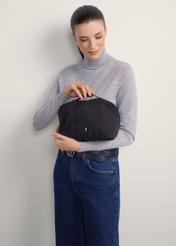 Black women's cosmetic bag TOREN-0323-99(Z25), front view of the product on a model, half of the silhouette visible.