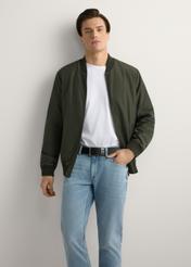Men's khaki bomber jacket KURMT-0413-8D(W26) - front product view, modeled, against a light background. Knee-length silhouette visible.