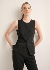 Elegant black women's vest KAMDT-0040-99(Z26), front view of the product on the model. Half of the silhouette visible.