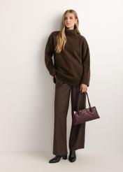 Burgundy, trapezoidal women's handbag with decorative stitching TORES-1363-4D(Z26), front view of the product on a model. Full body visible.