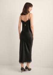 Black lace midi dress SUKDT-0289-99(Z26), product view from the back on the model. Full body visible.