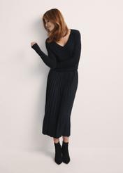 Black pleated women's dress SPCDT-0096-99(Z25), product visible from the front on the model, the entire silhouette is visible.
