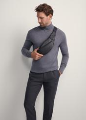 Men's black leather waist bag TORMS-0440B-99(Z25), product view on model. Half silhouette visible.