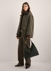 Women's leather shoulder bag TORES-1335-9I(Z26), front view of the product on a model. Full body visible.