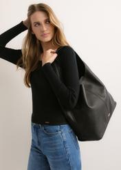 Black leather shopper bag TORES-1372-9I(Z26), diagonal view of the product on the model. Half of the silhouette visible.