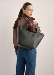 Women's black leather shopper bag TORES-1340-9I(Z26), front view of the product on a model. Half of the silhouette visible.