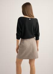 Black women's blouse BLUDT-0178-99(Z25), back view of the product on the model. Half of the silhouette visible.