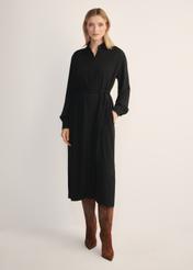 Women's black long-sleeved dress SUKDT-0246-99(Z25), front view of the product on the model. Full body visible.