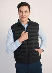 Black quilted men's vest KAMMT-0006-99(Z25), front view of the product on the model. Half of the silhouette visible.