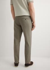 Men's dark brown suit trousers SPOMT-0098-1I(W26), product view from the back on the model. Half of the silhouette visible.