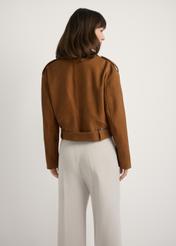 Cognac-colored leather biker jacket KURDS-0610-1F(W26), back view of the product on the model. Half of the silhouette visible.