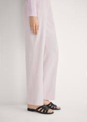 Women's leather flip-flops in black BUTYD-1266-99(W26), side view of the product on the model's feet.