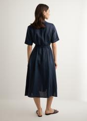 Dark navy linen midi shirt dress SUKDT-0281-7E(W26), back view of the product on the model against a light background. Full silhouette visible.