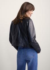 Women's black leather biker jacket KURDS-0273-99(KS), back view of the product on the model. Half of the silhouette visible.