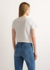 Cream women's T-shirt with print TSHDT-0166-0B(Z26) - back view of the product, on a model, against a light background. Half of the silhouette visible.