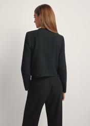 Women's black short blazer ZAKDT-0041-99(W26), back view of the product on the model. Half of the silhouette visible.