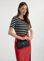 Black women's monogram handbag TOREC-0536B-99(W25), front view of the product on the model. Half of the silhouette visible.