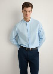 Light blue men's cotton shirt KOSMT-0326-7A(W26), front view of the product on the model. Half of the silhouette visible.