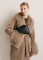 Black quilted women's handbag TOREC-1313-99(Z26); front view of the product held in a model's hand, against a light background.