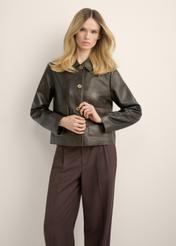Women's brown leather short jacket KURDS-0552-1H(Z26), front view of the product on a model. Half of the silhouette visible.