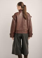 Burgundy oversized women's leather jacket KURDS-0644-4D(Z26), product view from the back on the model. Half of the silhouette visible.