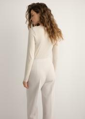 Light beige women's modal blouse LSLDT-0056-1A(W26), back view of the product on the model. Half of the silhouette visible.