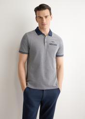 Men's navy blue polo shirt POLMT-0068-7E(W26), front view of the product on the model. Half of the silhouette visible.