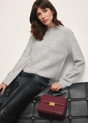 Burgundy women's trunk bag TOREC-1080-49(Z25), front view of the product on a model, half of the silhouette visible.