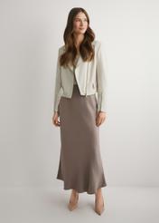 Brown women's skirt SPCDT-0122-1K(W26), front view of the product on the model. Full body visible.