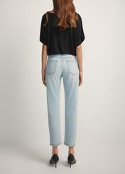 Light blue women's jeans JEADT-0011-7A(W26), back view of the product on the model. Half of the silhouette visible.