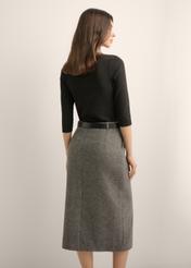 Women's black V-neck blouse LSLDT-0036-99(W26), back view of the product on the model. Half of the silhouette visible.