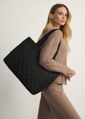 Black nylon women's bag TOREN-0224A-99(Z25), product view from the front on the model, the whole silhouette is visible.