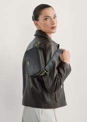 Black small women's handbag TOREC-1172-99(W26), diagonal view of the product on the model's silhouette.