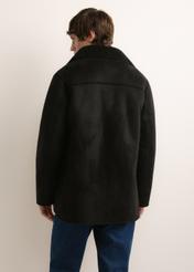 Men's black shearling coat KOZMP-0011-99(Z26), rear view on a model. Half of the figure is visible.