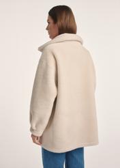 Women's double-sided sheepskin coat KOZDP-0009-24(Z24), product view from the back on the model, half of the silhouette visible.