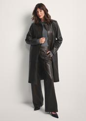 Brown women's long leather jacket KURDS-0544-2868(Z25), front view of the product on the model. Full body visible.